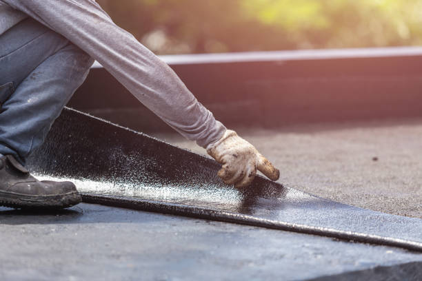 Professional Basement Waterproofing technician working in Linden, VA